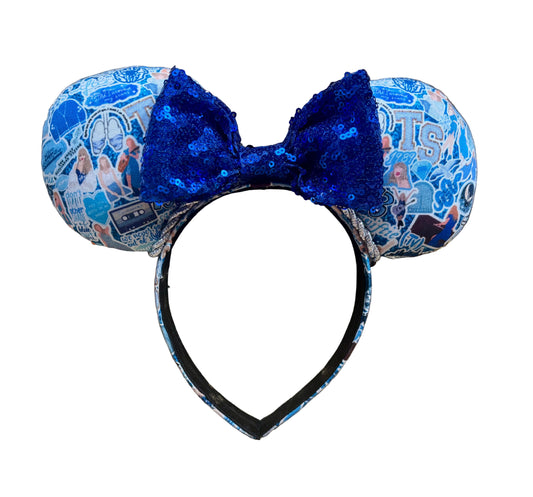 No Other Shade of Blue handmade mouse ears on a black universal headband with a blue sequin bow, shown on a white background.