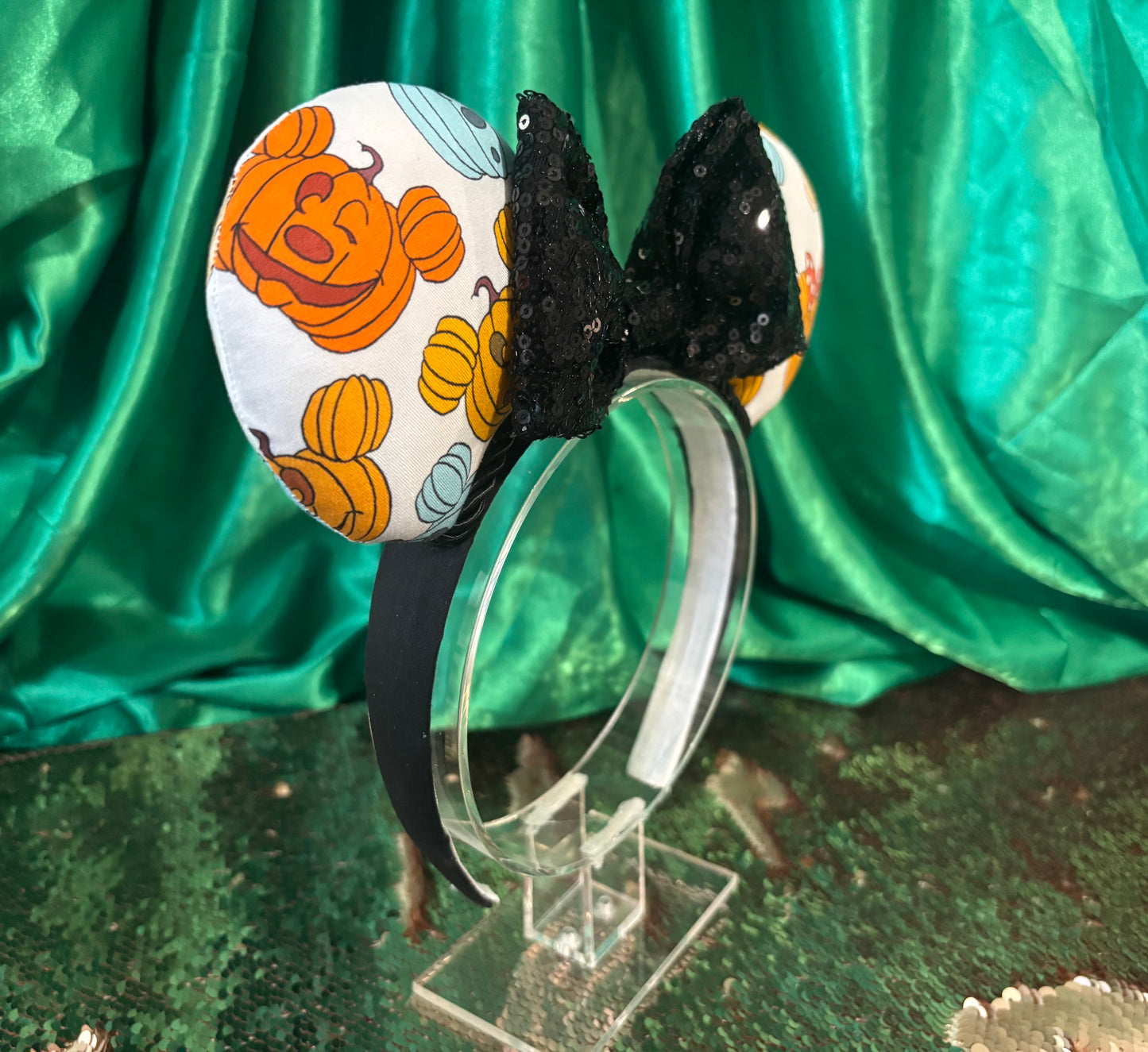 Angled view of pumpkin mouse ears. Handmade and ready to ship.