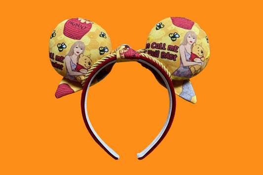 Back view of custom ears showing TS and Pooh on both sides.