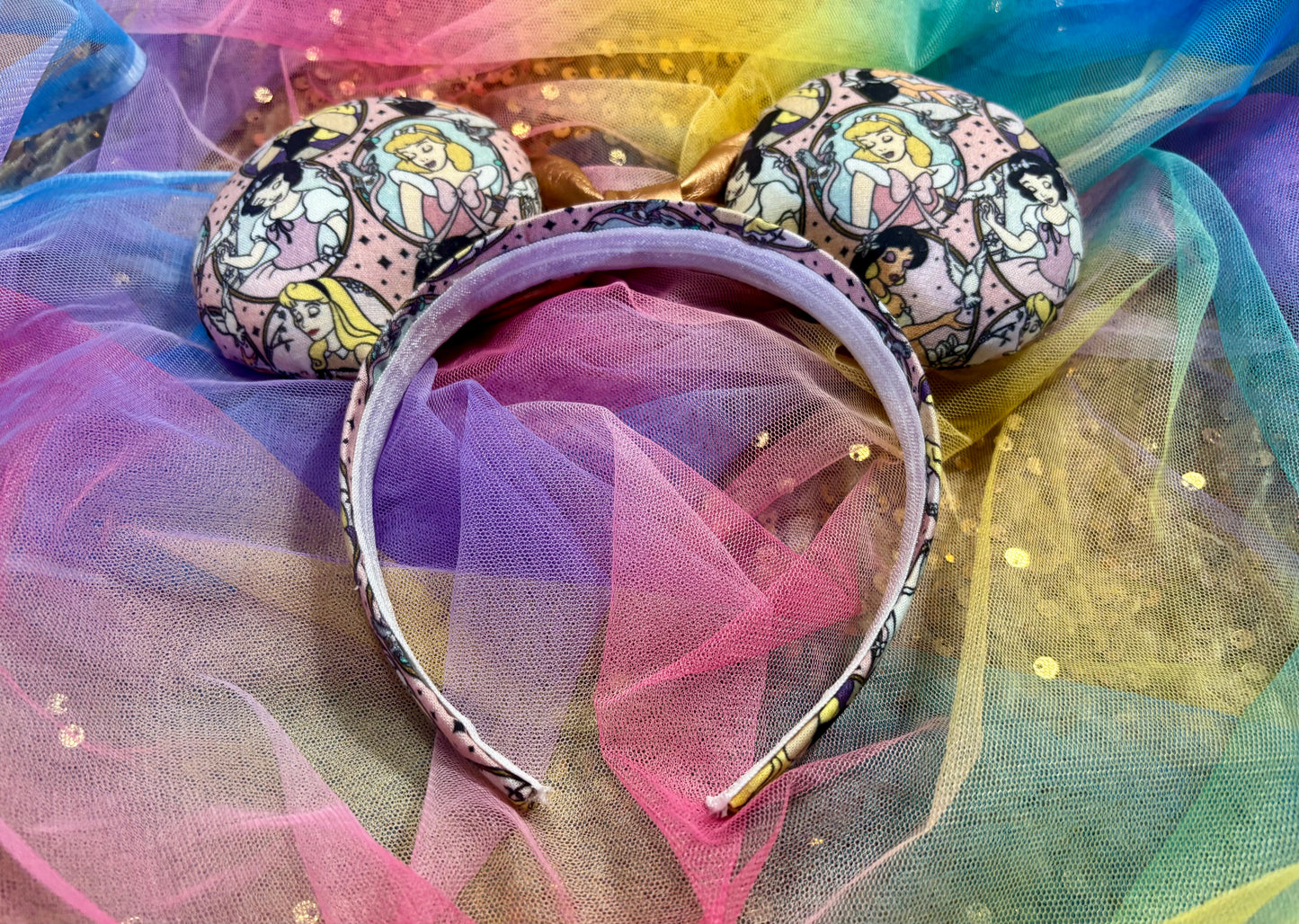 Mouse ear headband with princess design on a colorful tulle background