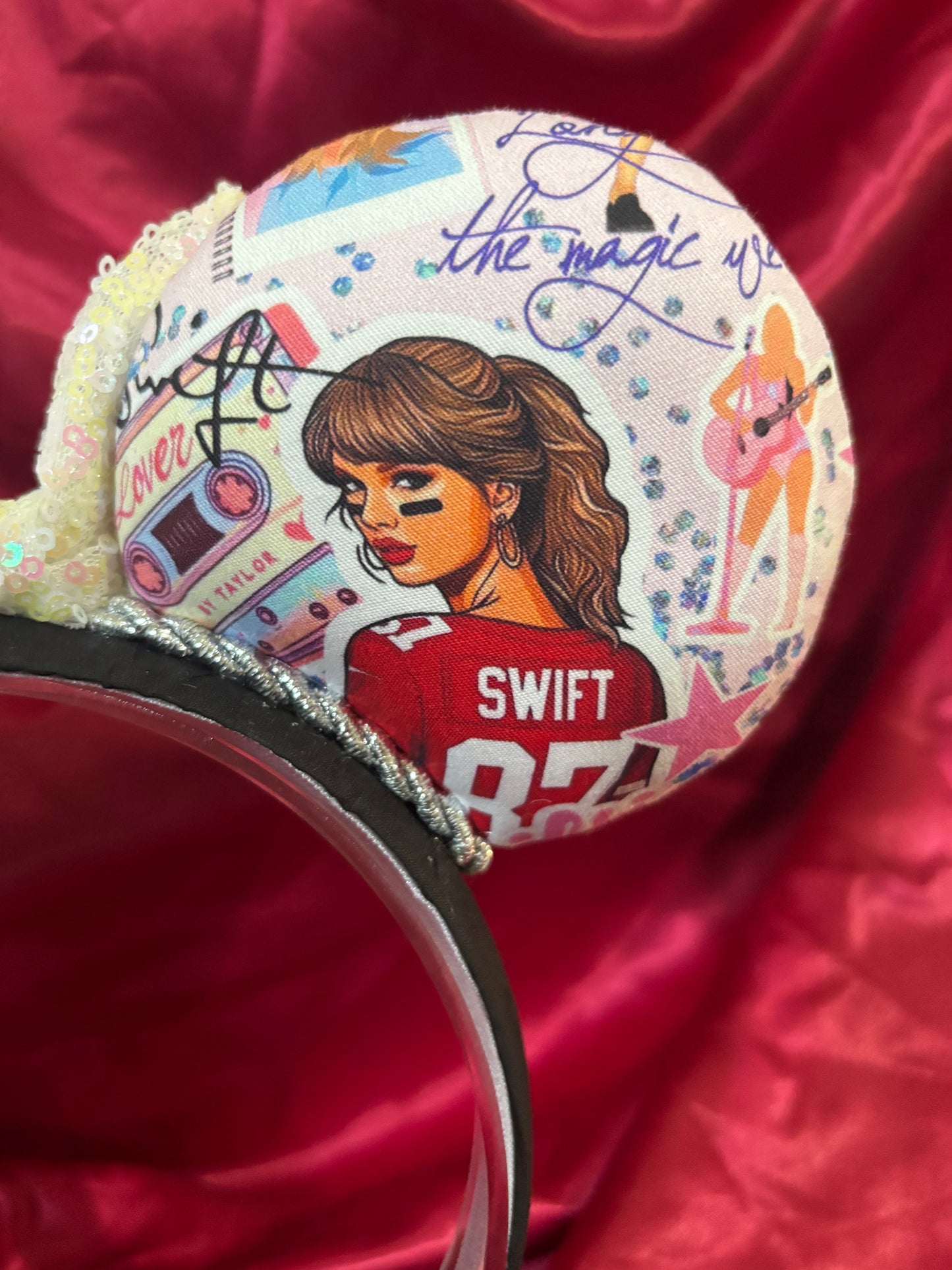 The back right custom ear view with multiple cartoon Taylor's on them.