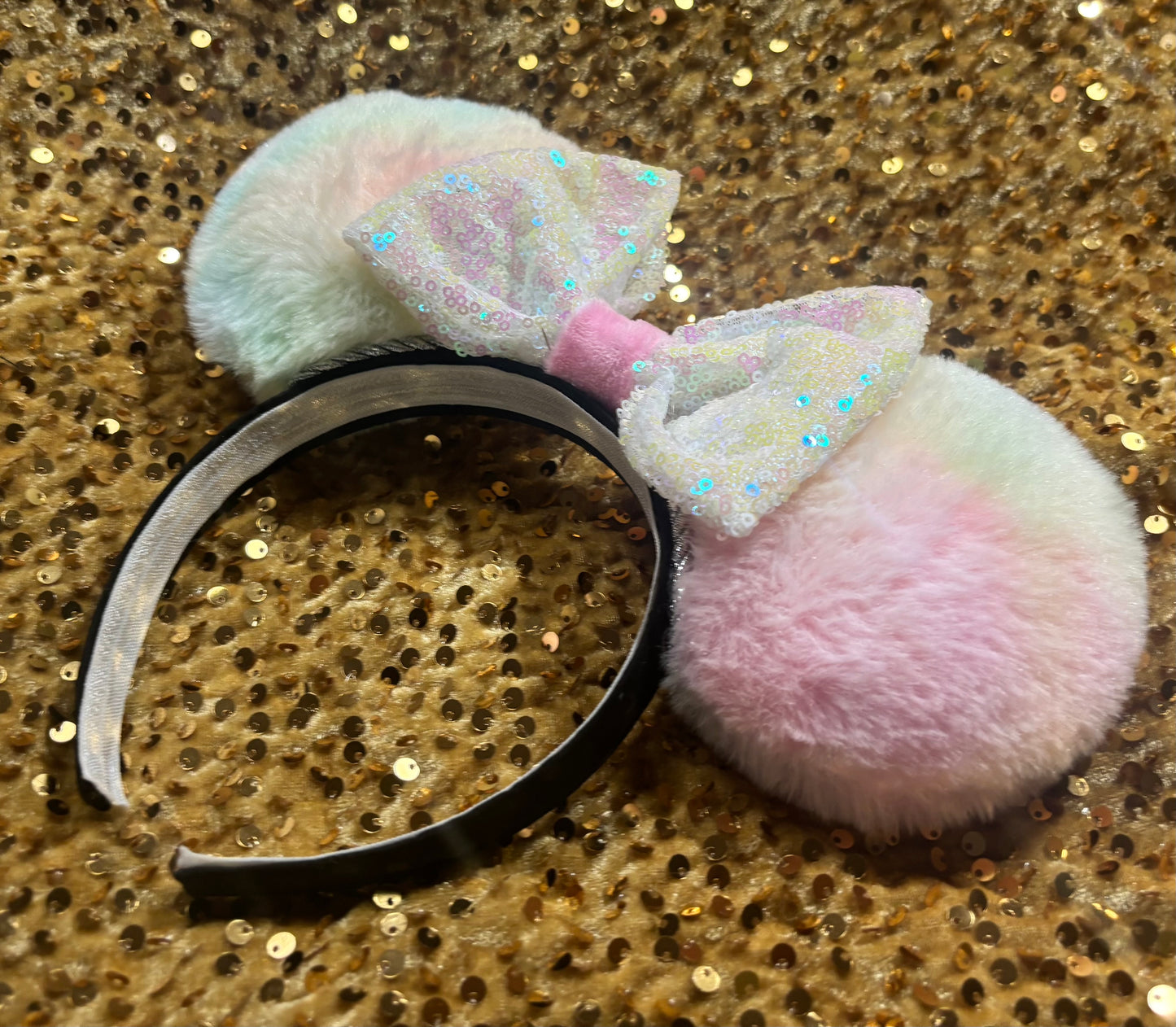 Handmade and ready to ship Fluffy Pastel-colored mouse ears with a white iridescent sequin bow