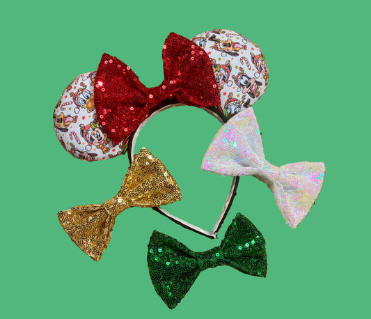 Handmade and ready to ship mouse ears. Mouse ears are on a universal sized poly cotton headband and set comes with a red sequin bow. Other colors are available if you leave a note.