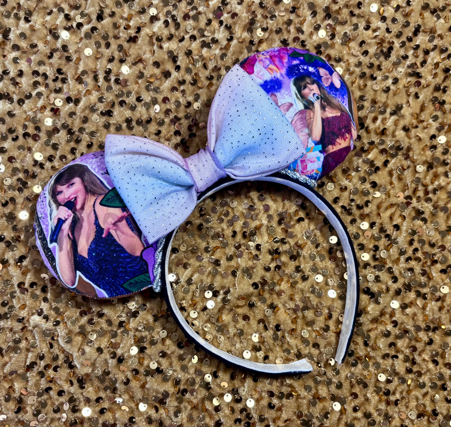 Handmade and ready to ship TS Mouse ears with a new beautiful sewn tulle bow with sparkles on it. Of course, you can still request any bow in sequin if you prefer and I will attach it. Shown on a gold sequin background.