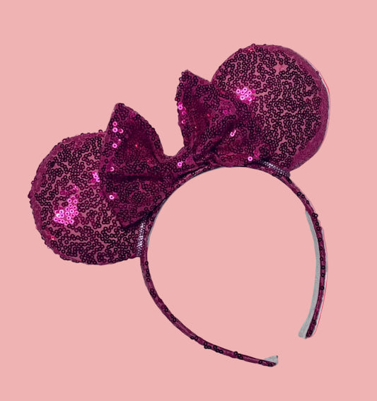 Handmade and ready to ship, Hot Pink Custom Ears. Fabric is on ears front and back with pink rhinestone trim along the inner ears and a matching hot pink sequin bow. The Headband is universal sized and has the same hot pink sequin fabric.