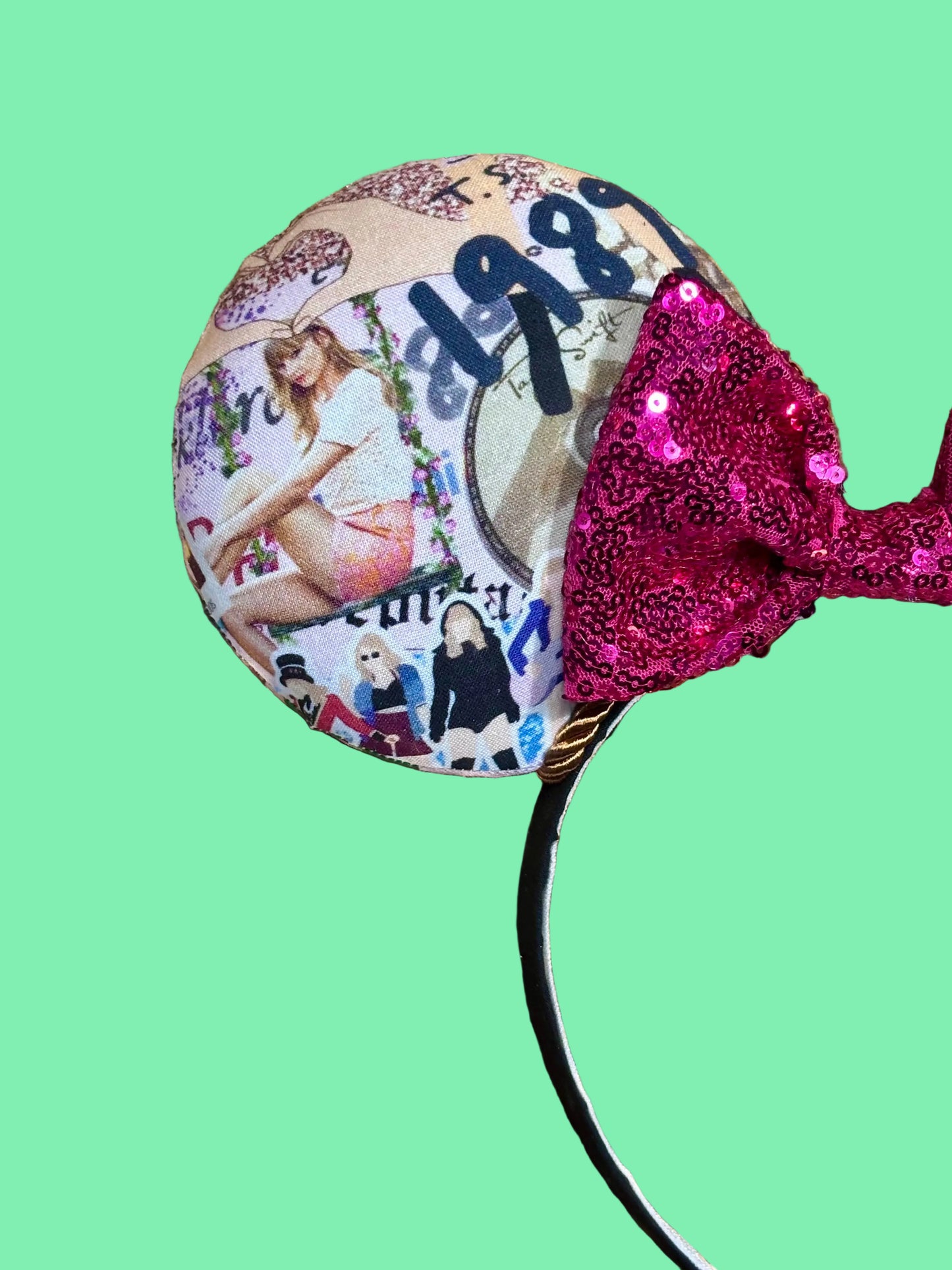 Mouse ears with Tay collage pictures with a pink bow and collage design on a gold sequin background. Front right side of headband view.