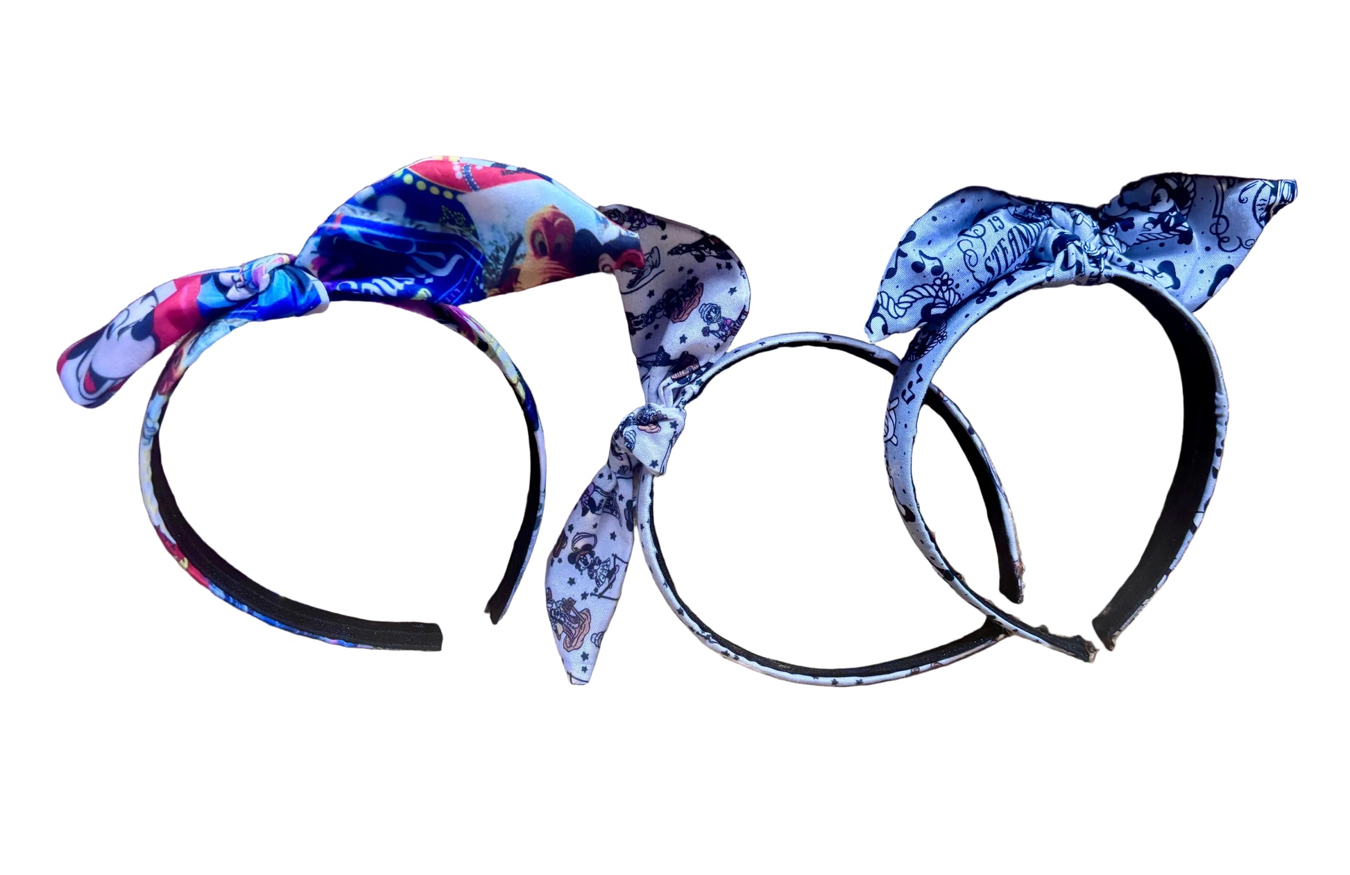 Handmade and ready to ship. Three decorative headbands with classic various Mickey prints on them with a twisted bow on headband you can adjust to any side you prefer.
