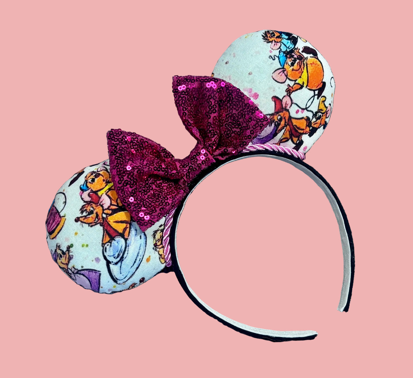 Handmade and ready to ship Sewing Mice mouse ears with the fabric on both the front and back. The headband is black universal sized and fits most. The set has a hot pink sequin bow with pink twisted trim along the inner mouse ears.