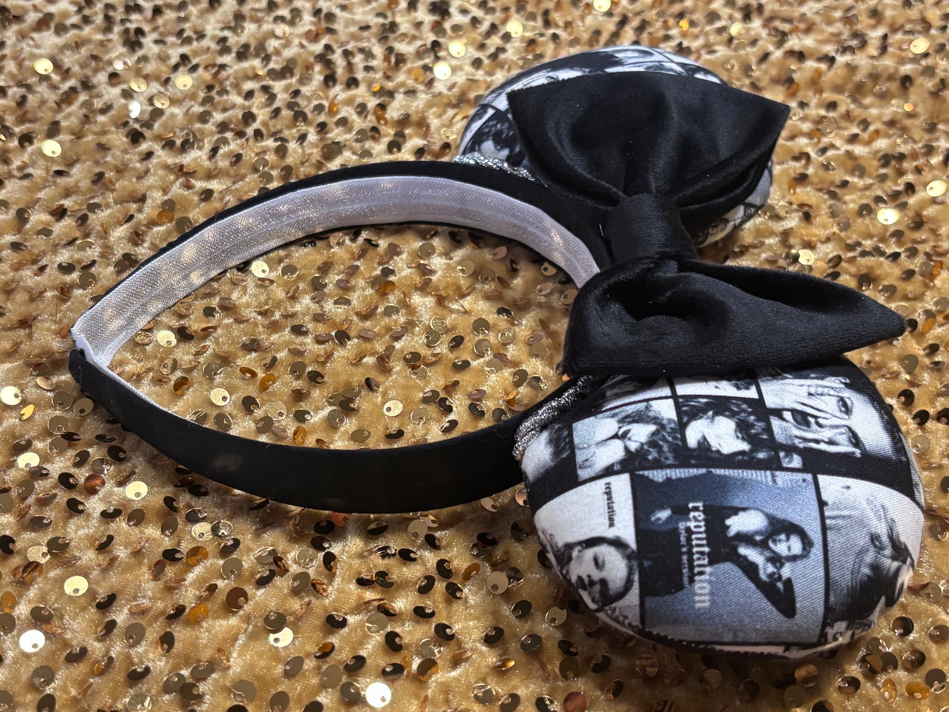 Side View of Handmade and ready to ship "BAD' reputation Mouse ears with a new beautiful black velvet bow. Of course, you can still request any bow in sequin if you prefer and I will attach it. Shown on a gold sequin background.