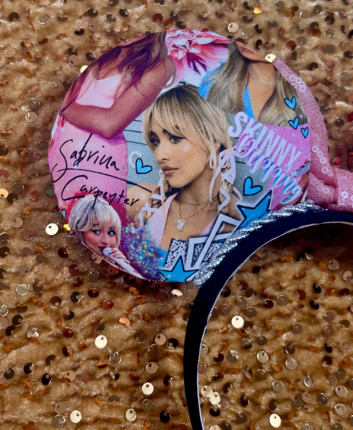 Back side of mouse ears. Close up of back left mouse ear and the images on ear.