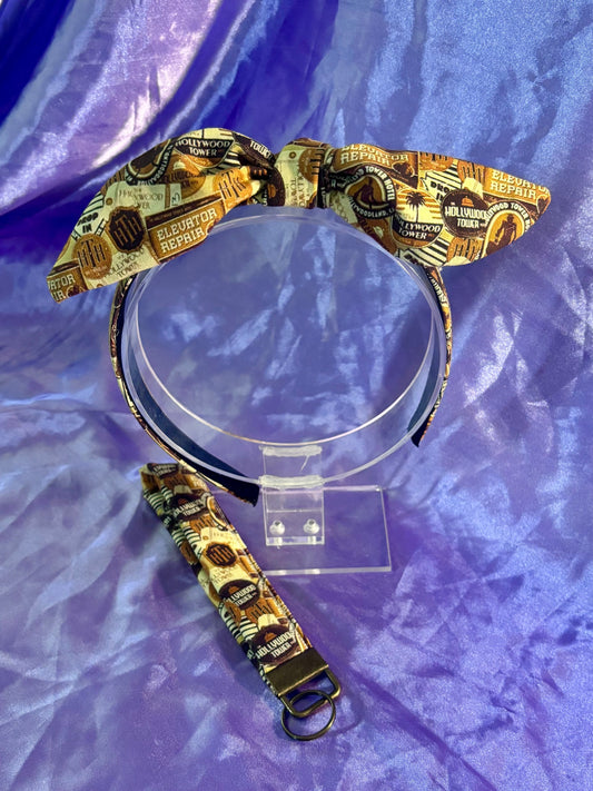 Handmade and ready to ship with free shipping. Tower of terror inspired twisted bow headband and keychain wristlet. Headband is universal sized and fits most. The bow can be slid to any side of the headband you prefer. 