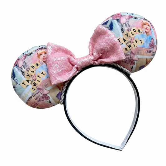 Handmade and ready to ship. TS Mouse Ears with a light pink bow. shown on a white background 