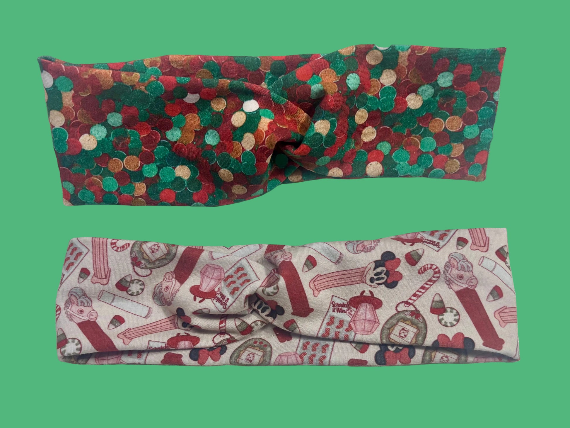 Two handmade and ready to ship twisted headbands. One in Christmas color dots and the other in Stocking Stuffers. Made with cotton Lycra fabric.