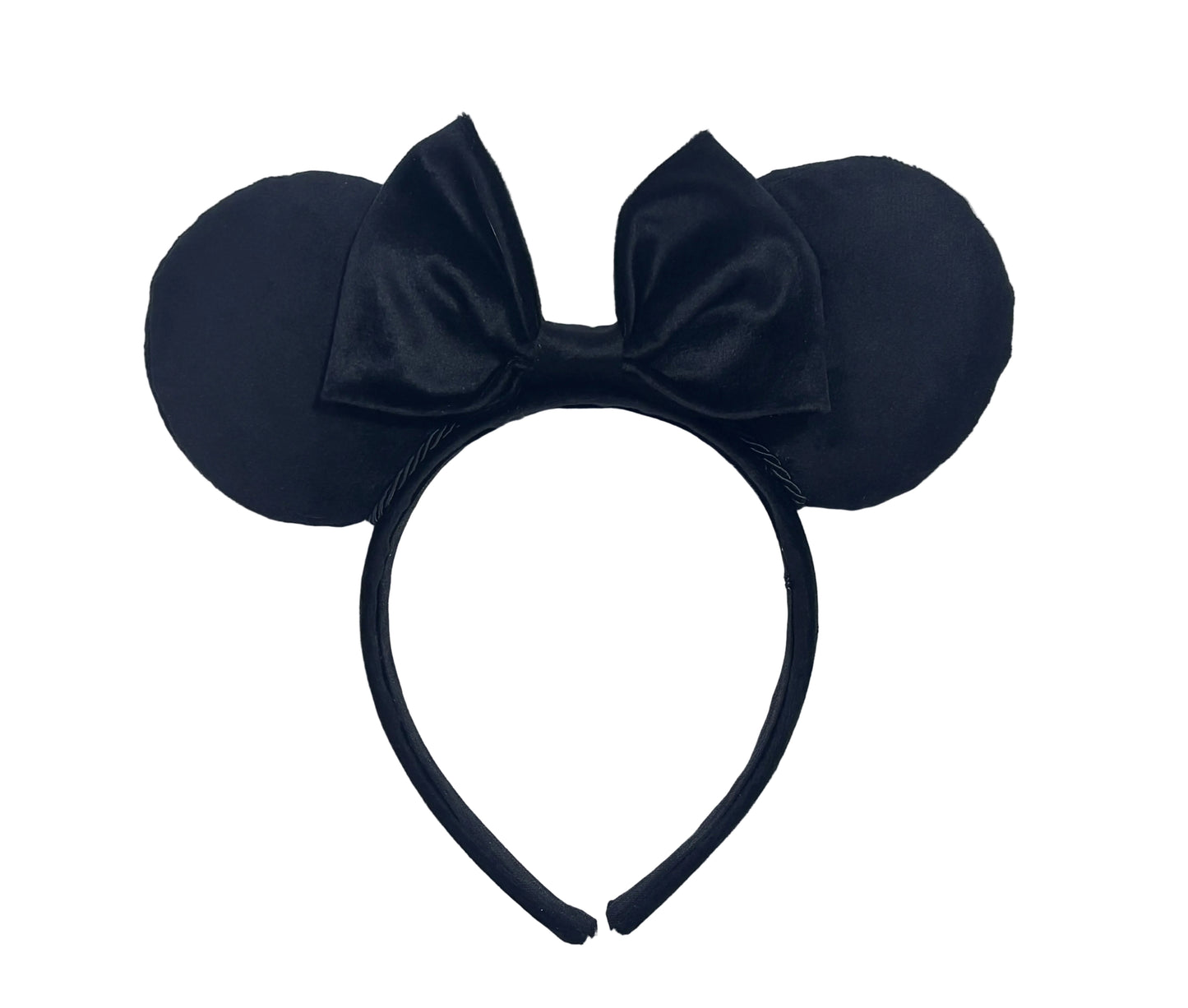 Velvet Black mouse ears headband with a bow on a textured white background