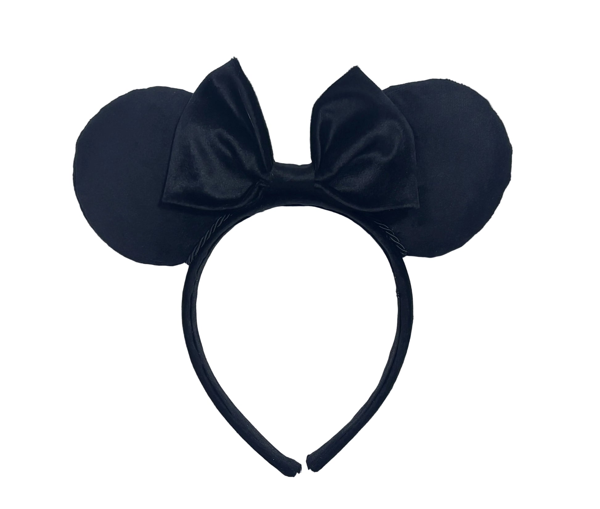 Velvet Black mouse ears headband with a bow on a textured white background