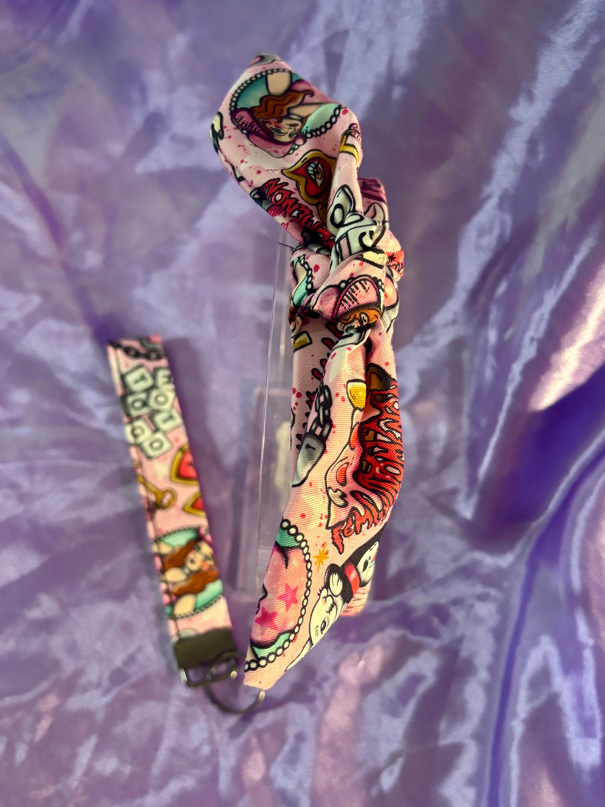 Handmade and ready to ship twisted bow headband and keychain wristlet. Both have Chappell inspired fabric on them. front and backs.