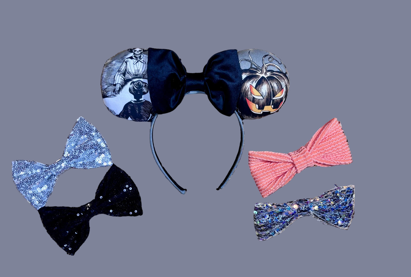 Handmade and one of a kind Halloween mouse ears with the fabric on both the front and back. Skeleton ghost having a seance on one side and an evil pumpkin on the other ear. The headband is grey and universal sized and fits most. The set has a black velvet bow. Various bows shown. I will attach any color you want if you leave me a note in your order.