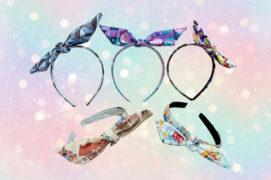 Set of colorful headbands with bow designs on a gradient background