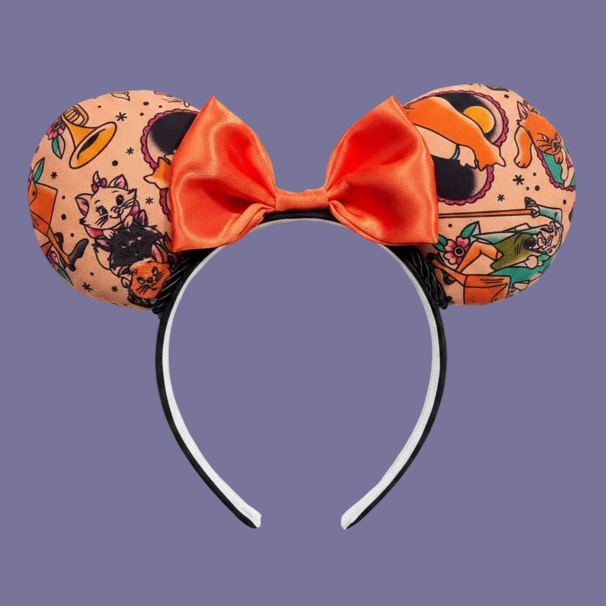 Handmade and ready to ship Cat Lovers Mouse ears with an orange satin bow with black twisted trim and on a black universal sized headband. 