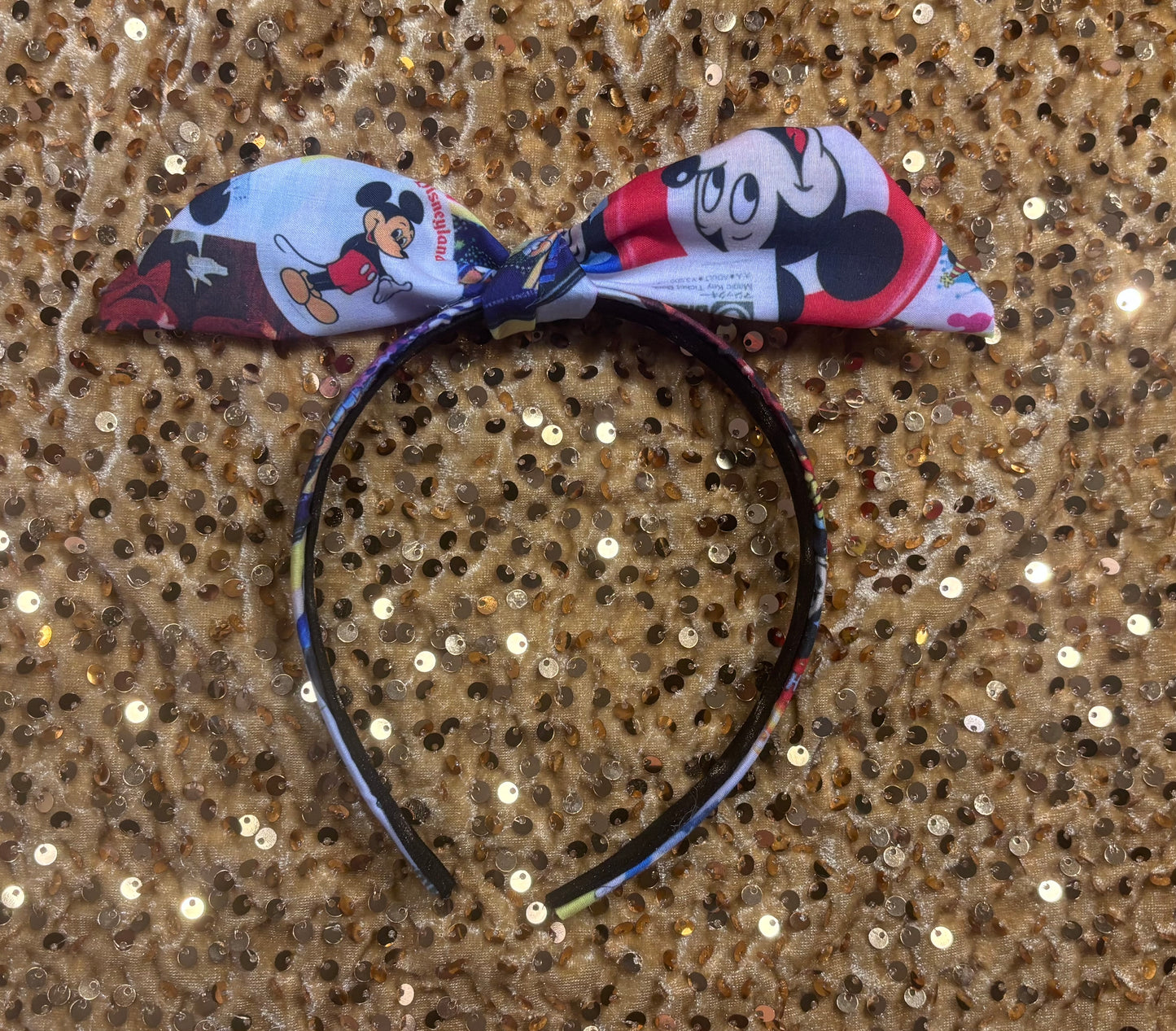 Park themed twisted headband showing views of Mickey and friends.