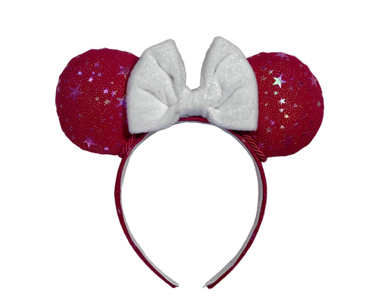 Handmade and ready to ship red mouse ears with iridescent stars on both the front and back along with the headband as well. The set has a white soft bow. Item is shown on a white background.
