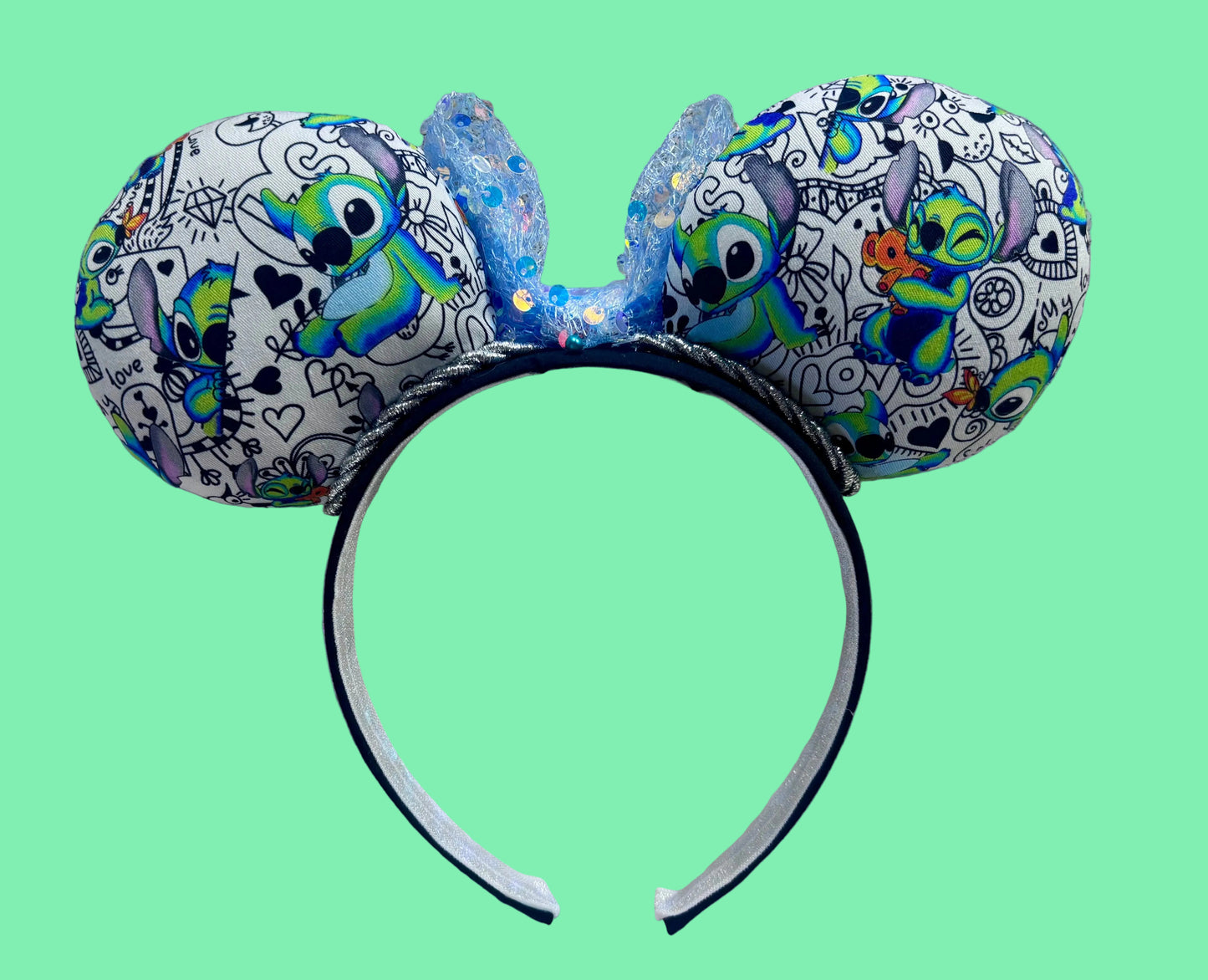back of mouse ears to show stitch inspired print.