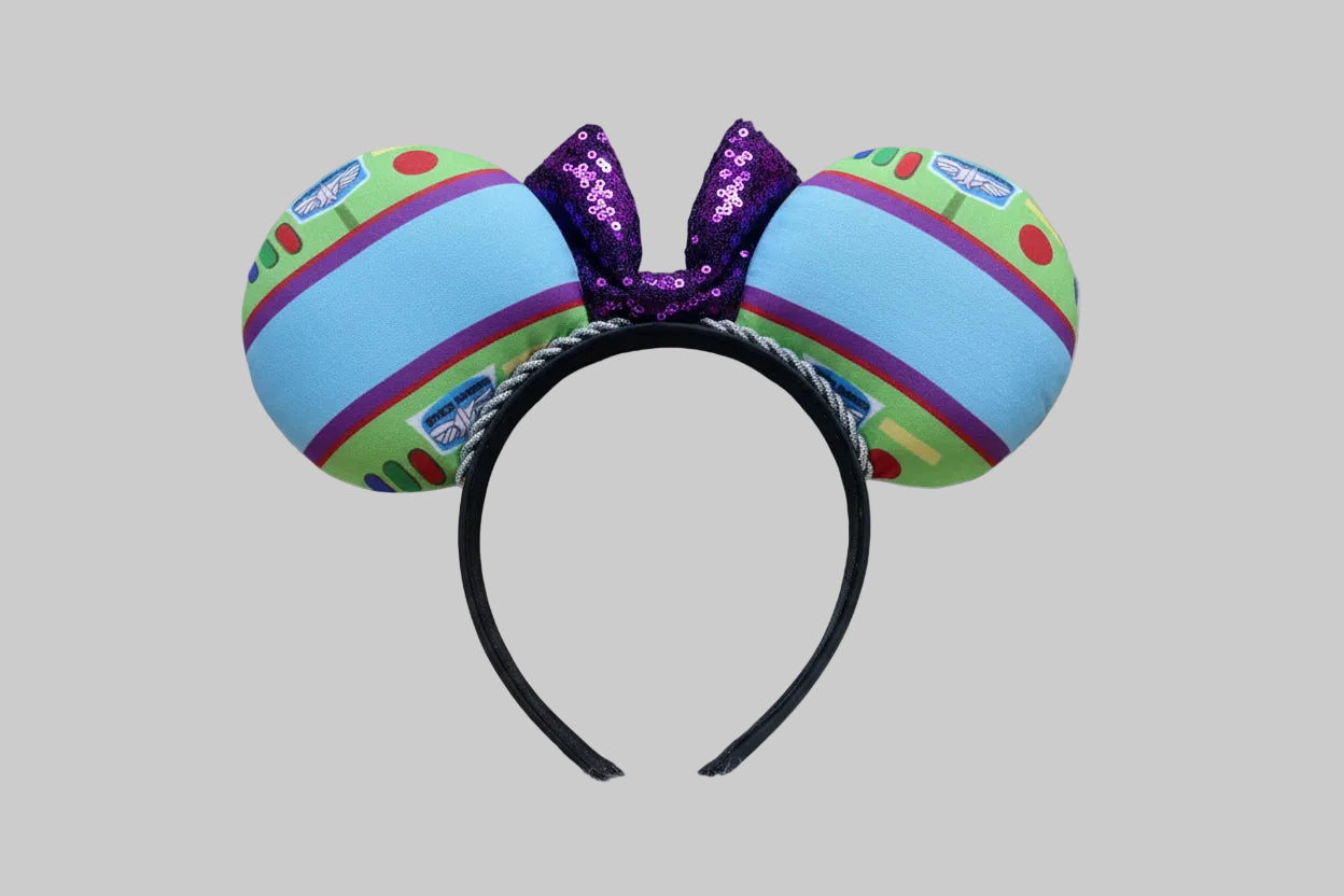 Back view of Space Ranger mouse ears on a white surface