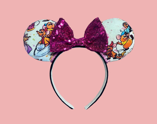 Handmade and ready to ship Sewing Mice mouse ears with the fabric on both the front and back. The headband is black universal sized and fits most. The set has a hot pink sequin bow with pink twisted trim along the inner mouse ears. 