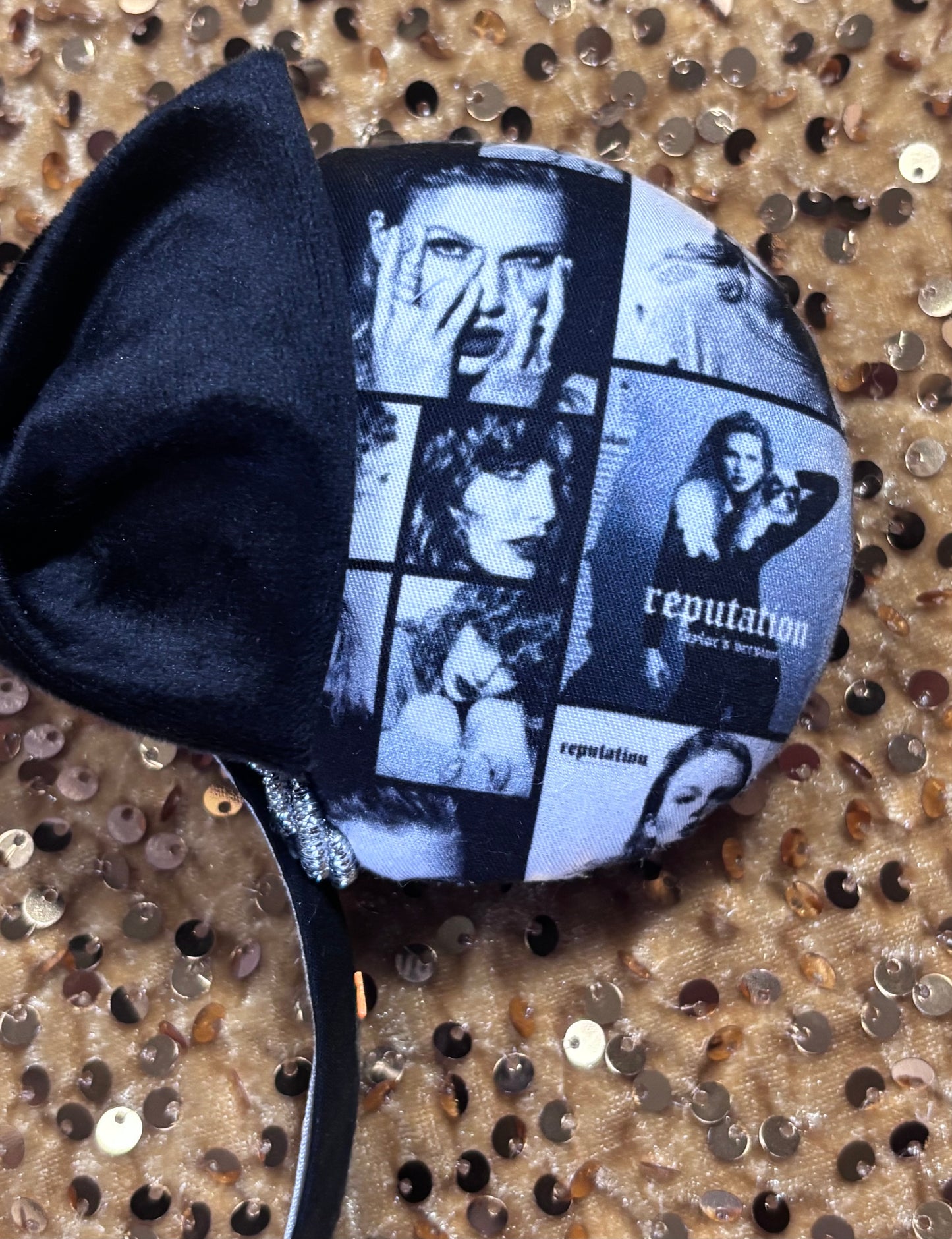 Close up of front details and images. Handmade and ready to ship "BAD' reputation Mouse ears with a new beautiful black velvet bow. Of course, you can still request any bow in sequin if you prefer and I will attach it. Shown on a gold sequin background.
