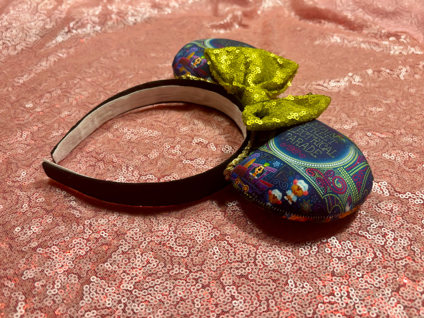 Handmade and ready to ship mouse ears. Mouse ears are on a universal sized poly cotton headband and set comes with a lime green sequin bow. Other colors are available if you leave a note.