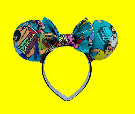 Handmade and ready to ship Burger Boss Mouse ears with the fabric on the ears, front and back and the bow. The headband is a universal sized headband and has black poly cotton fabric on it.