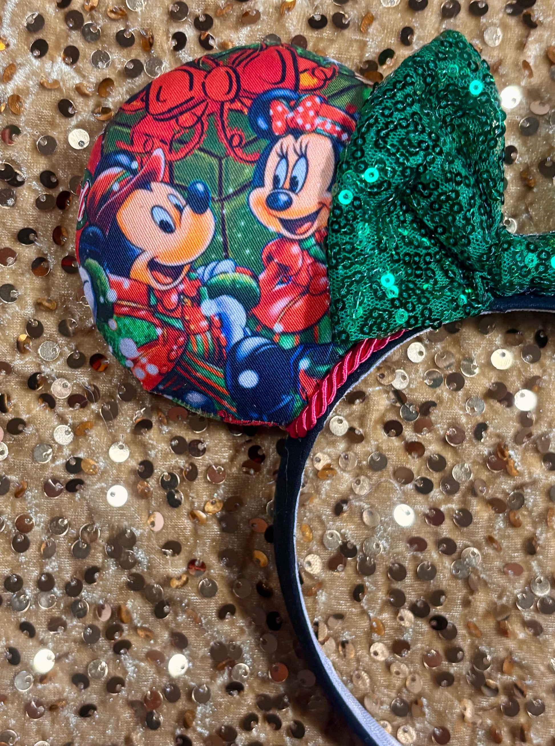 Close up of front of mouse ear with characters on them. Made and ready to ship. 