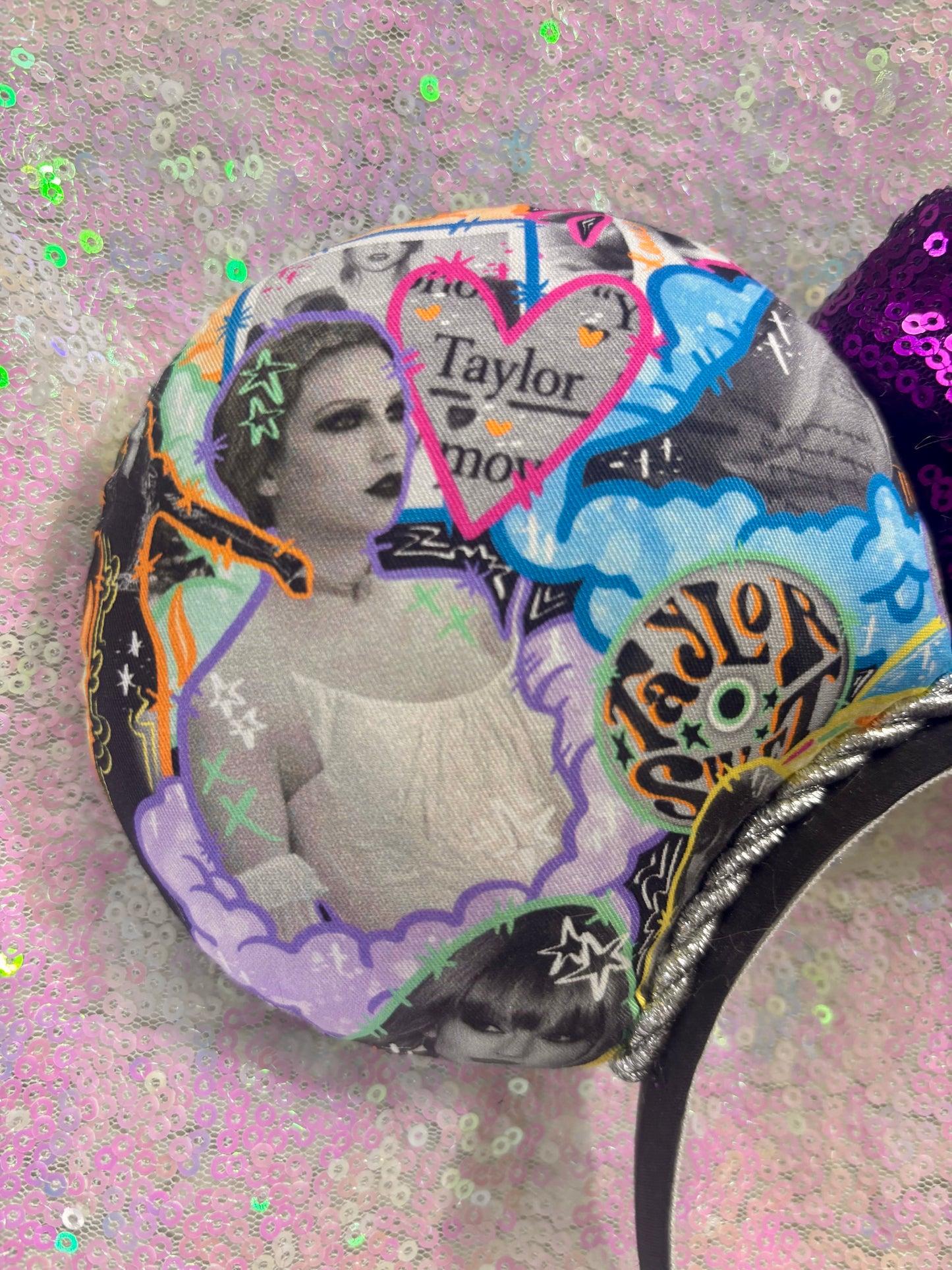 Handmade and ready to ship. Fabric images inspired by Tay and the fortnight video is on the front and back with a purple sequin bow. Shown on a white glitter background.