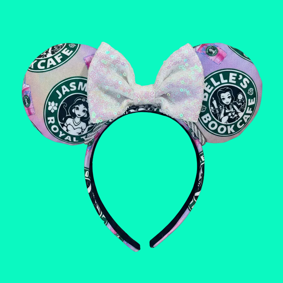Handmade and ready to ship custom ears with popular coffee themed with princesses on fabric. White iridescent bow and silver twisted trim on a universal sized headband with matching design as the mouse ears.