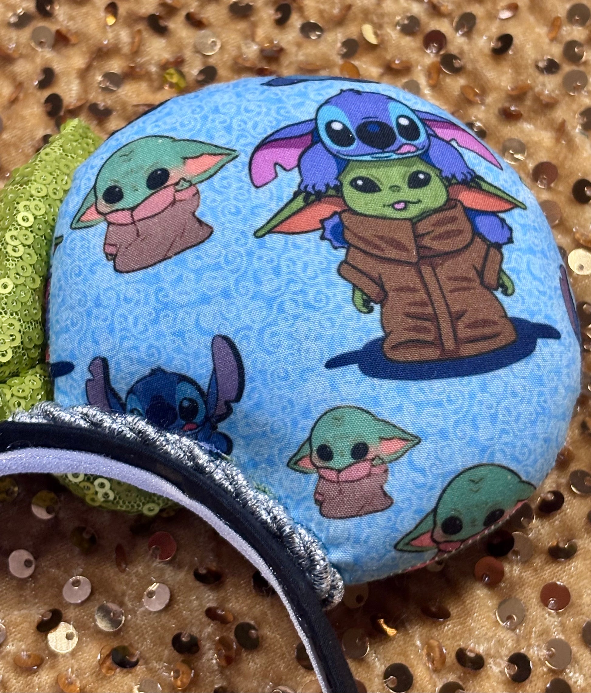 Handmade and ready to ship small friend aka Stitch and Baby Yoda Mouse ears with a lime green sequin bow. Of course, you can request any bow in sequin if you prefer and I will attach it. Shown on a white background.