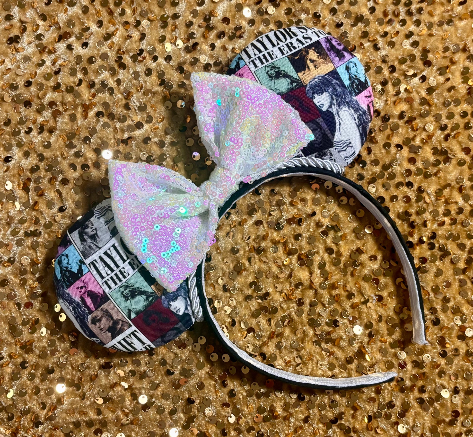 Handmade and ready to ship ERAS EARS with the fabric on both the front and back. On a black universal sized headband. The set has a WHITE IRIDECSENT sequin bow, but you can request any sequin color in your order and I'll attach it.