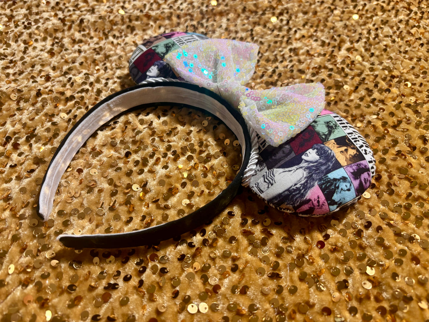 Handmade and ready to ship ERAS EARS with the fabric on both the front and back. On a black universal sized headband. The set has a WHITE IRIDECSENT sequin bow, but you can request any sequin color in your order and I'll attach it.