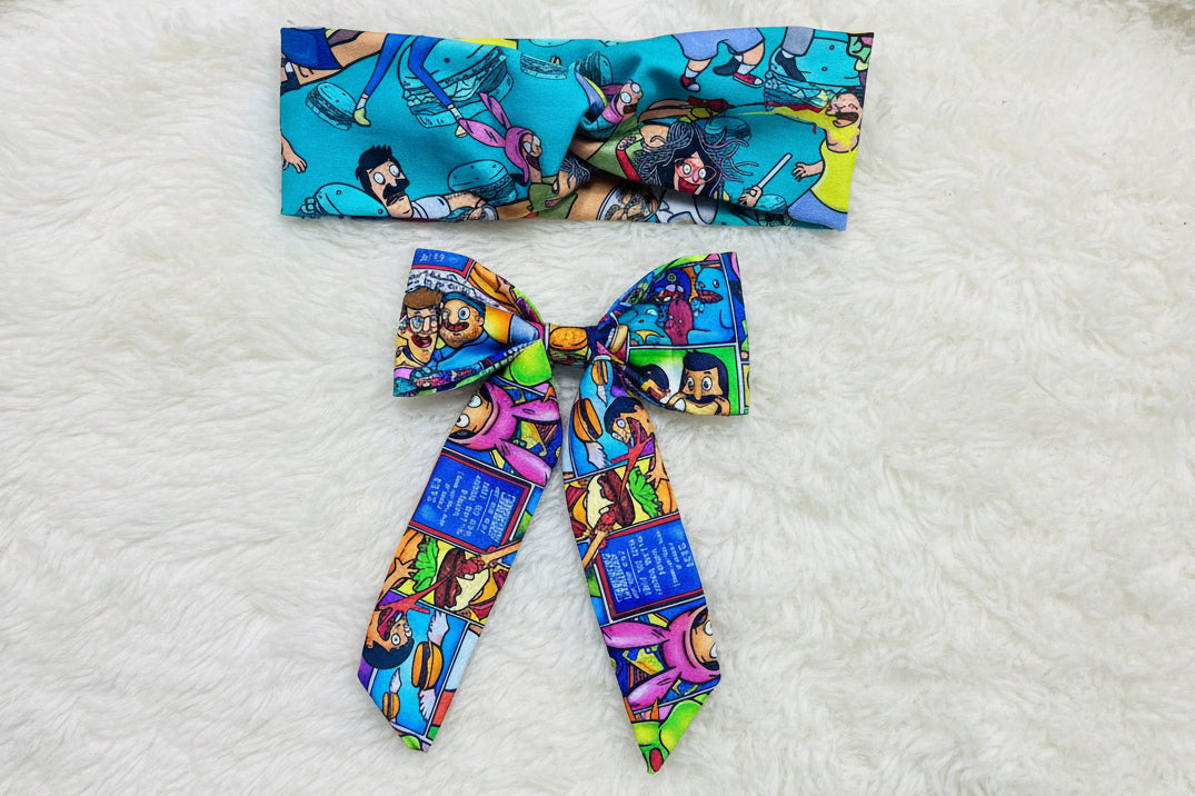 Colorful twisted headband wrap and bow with cartoon characters from Bobs Burgers  design on a white background