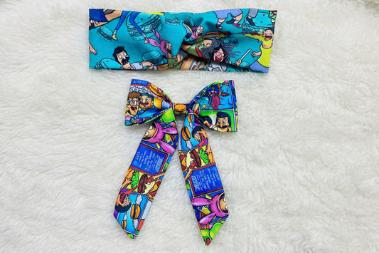 Colorful twisted headband wrap and bow with cartoon characters from Bobs Burgers  design on a white background