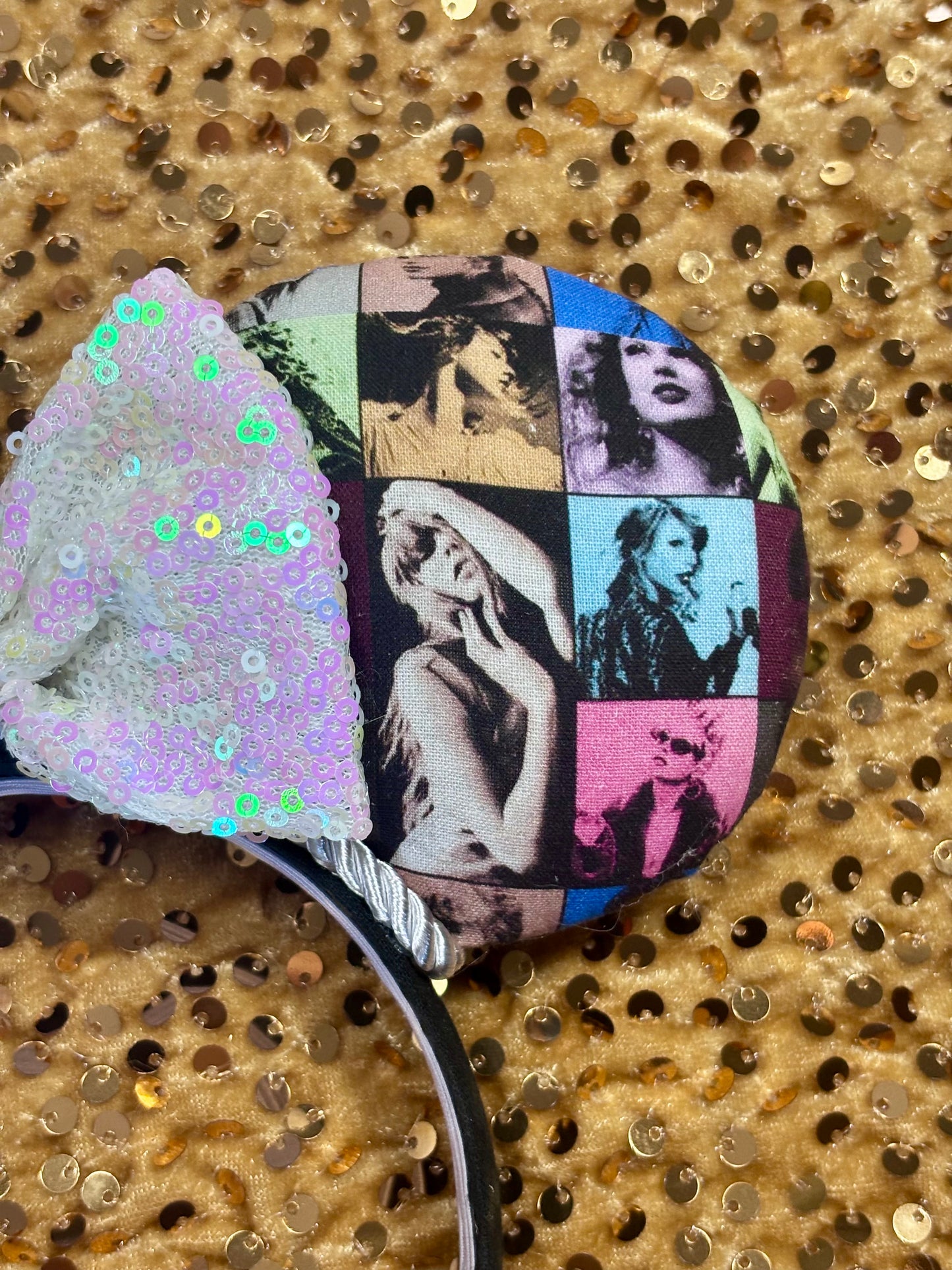 Eras Mashup Mouse Ear headband with white iridescent sequin bow. You can request any color sequin bow in your order by leaving a note. Handmade and ready to ship with fabric on both the front and the back of mouse ears. The set has a silver twisted trim along the inner ears. Ears are on a black poly cotton universal sized headband. Close up of the front right side of mouse ear.