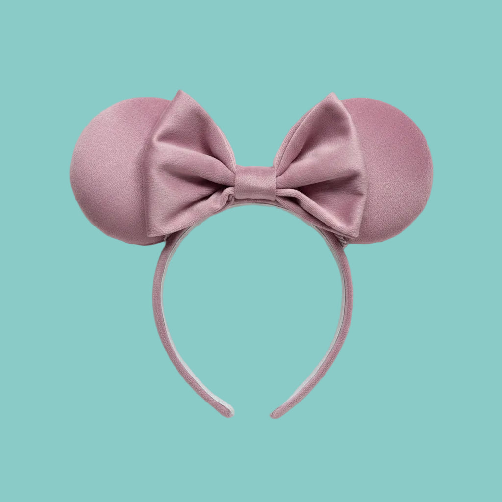 Handmade and ready to ship. Soft Velvety dusty pink Mouse ears with a soft matching bow with pink twisted trim on a universal sized matching headband. 