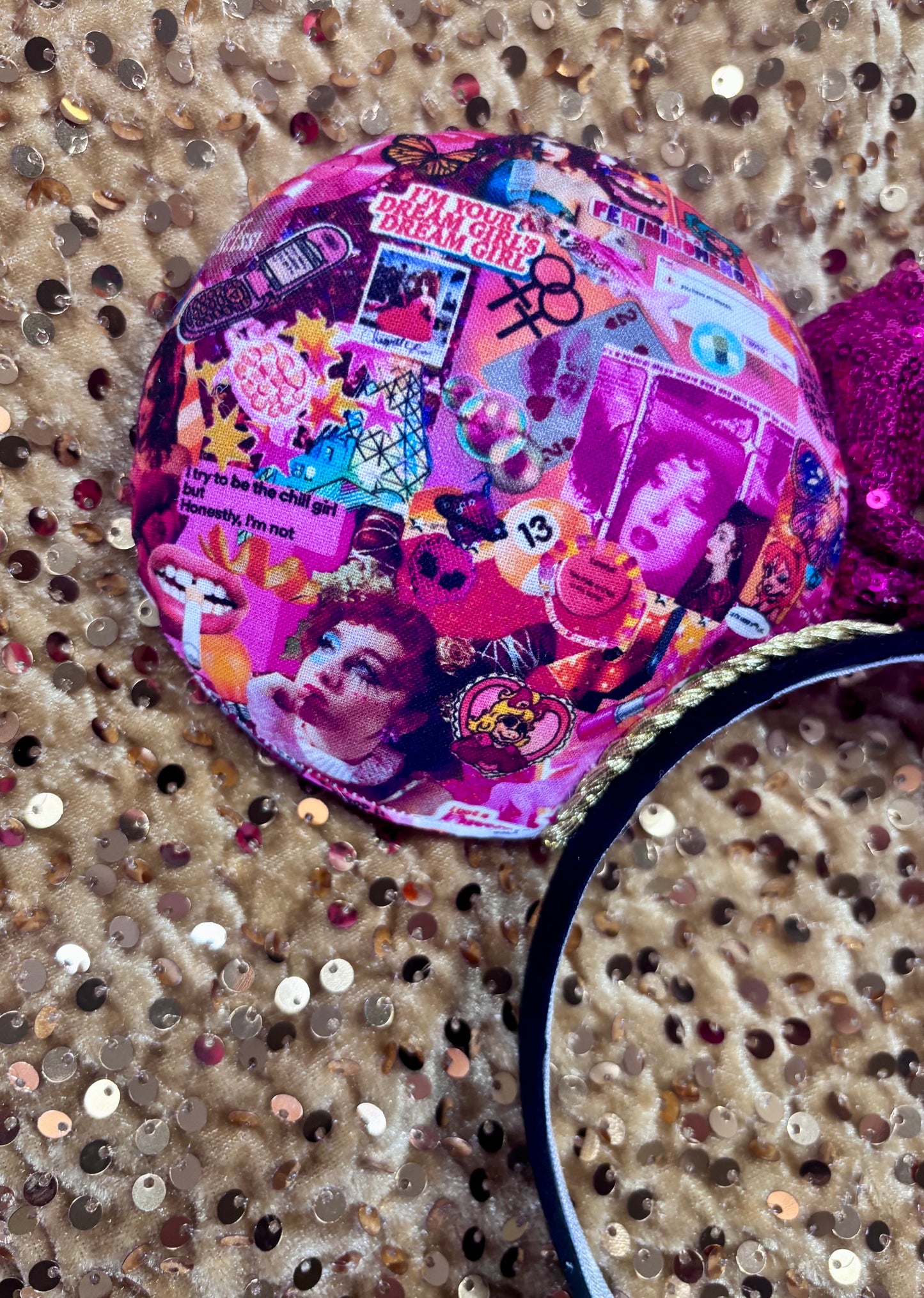 Handmade and ready to ship Colorful Chappell inspired Mouse ears with a hot pink bow on a headband against a gold sequin background.