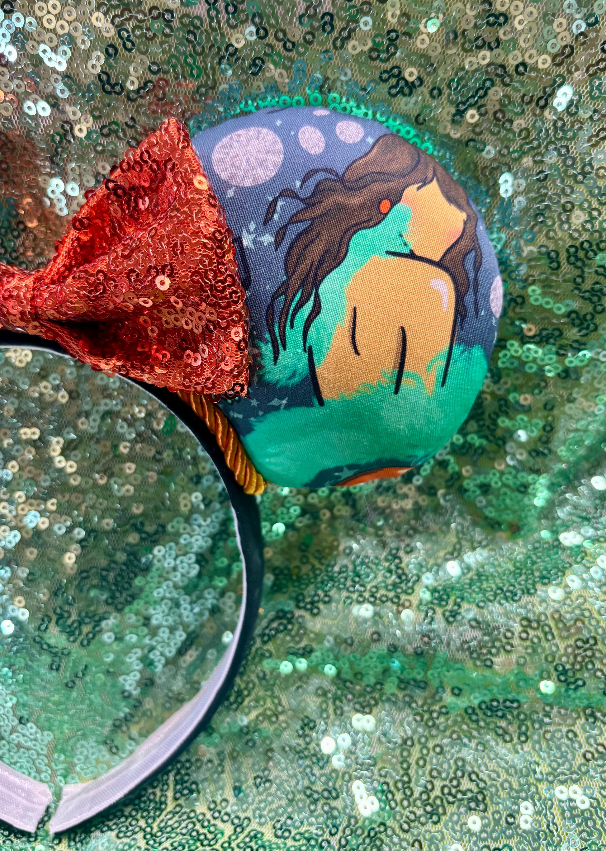 Close up of the other ear with a cartoon image of TS. Handmade and ready to ship. 