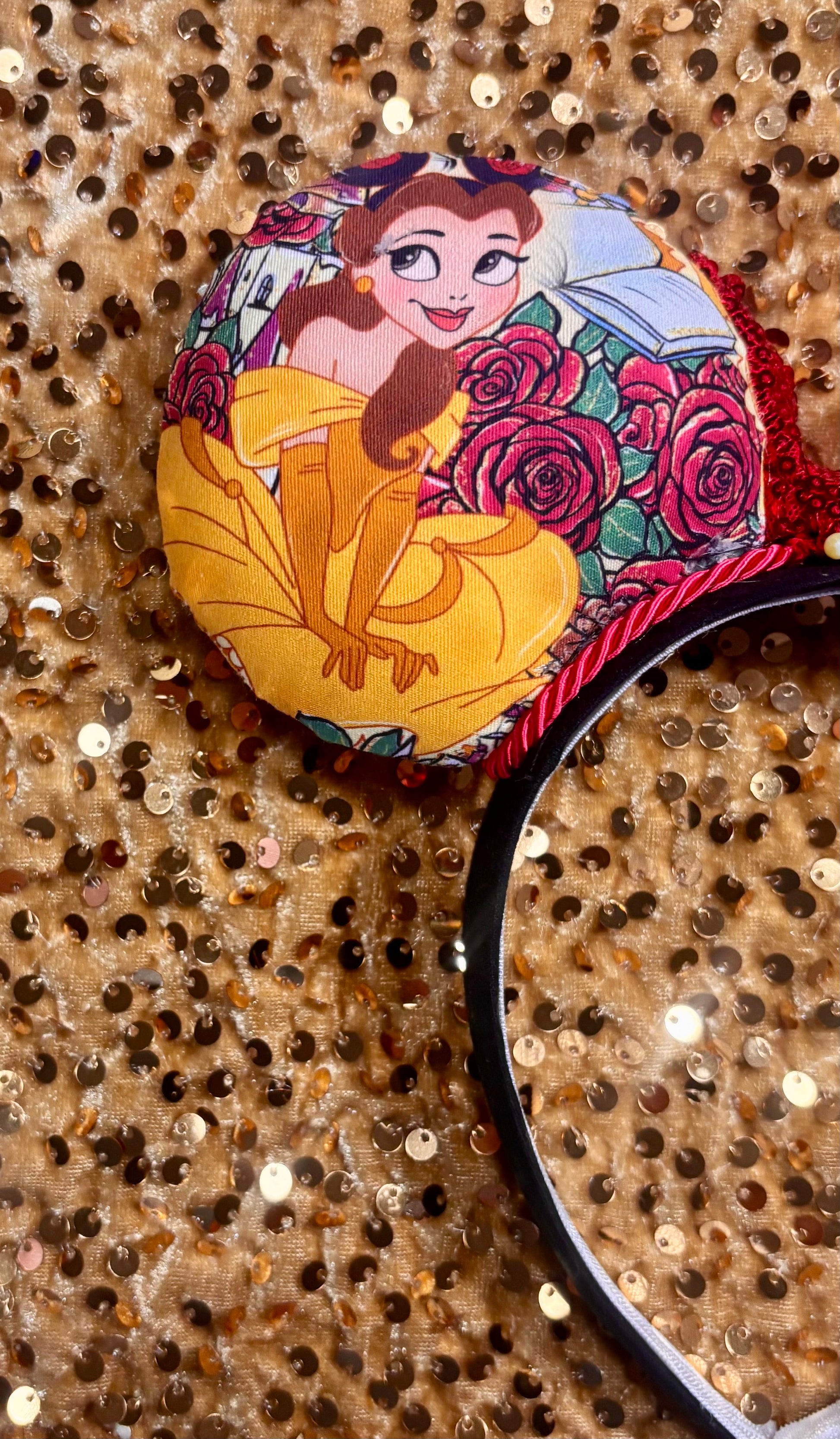 Belle from Beauty and the Beast-themed headband with Belle wearing mouse ears with red twisted trim and a red sequin bow. Handmade and ready to ship. Back closeup view of mouse ear. 