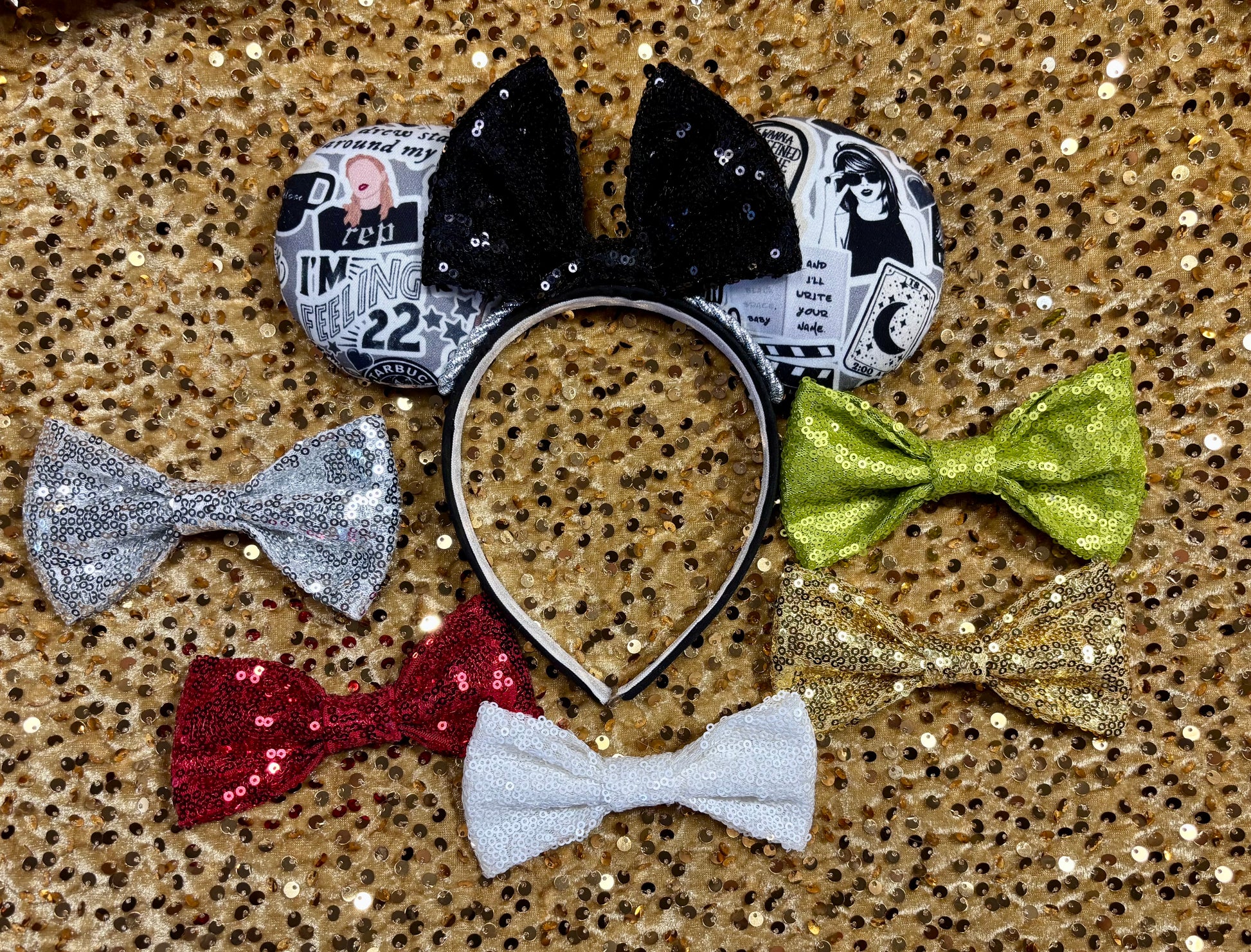 Mouse Ears with Black and White Swiftie sayings and pictures. has a black sequin bow. also shown are other sequin bow color options, you pick your bow color!