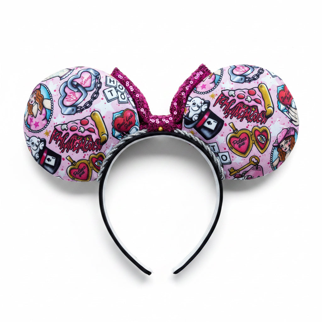 Colorful and handmade Chappell inspired Mouse ears headband with pink and black design on a white background