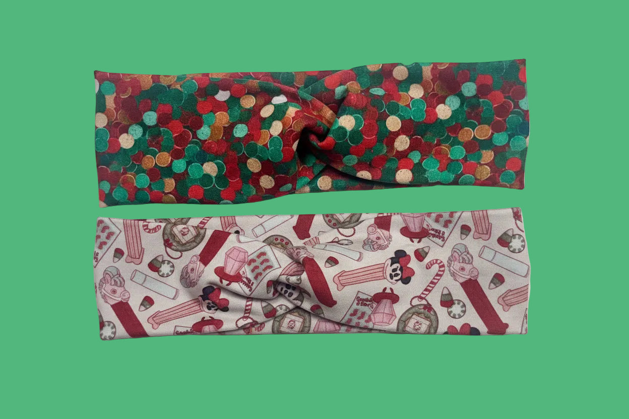 Two handmade and ready to ship twisted headbands. One in Christmas color dots and the other in Stocking Stuffers. Made with cotton Lycra fabric.