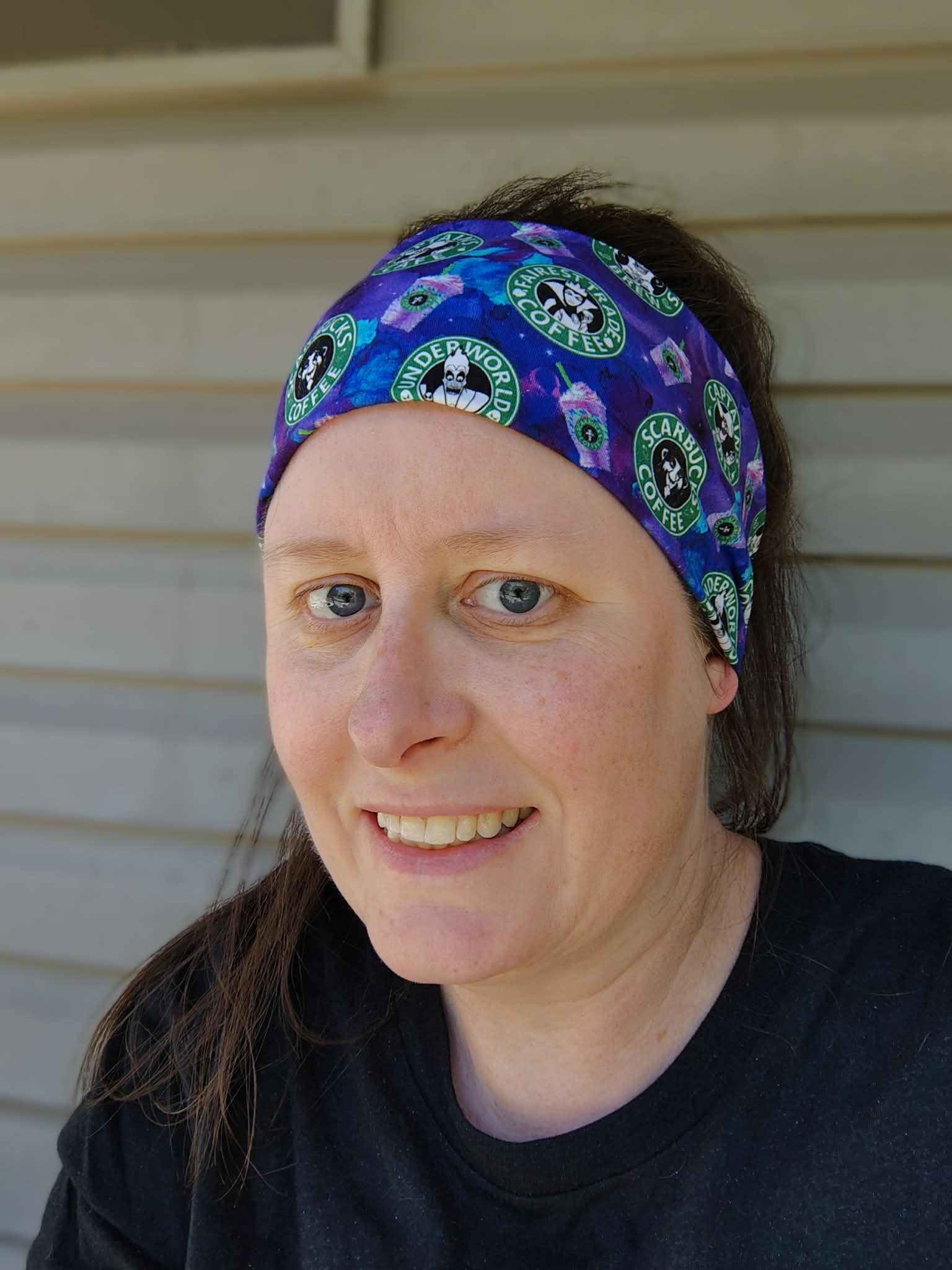 T. wearing the caffeinated villains headwrap.
