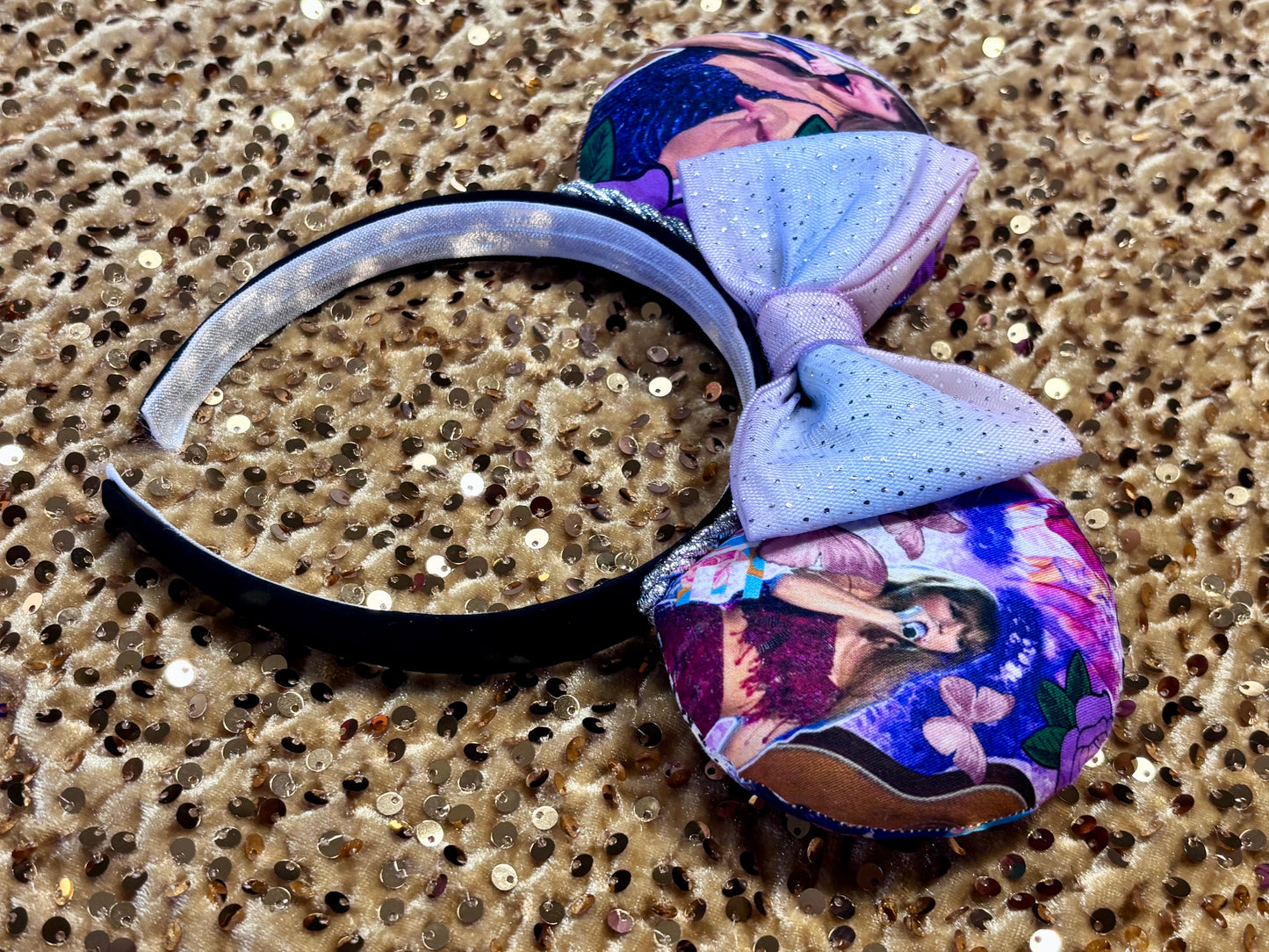 Side view. Handmade and ready to ship TS Mouse ears with a new beautiful sewn tulle bow with sparkles on it. Of course, you can still request any bow in sequin if you prefer and I will attach it. Shown on a gold sequin background.