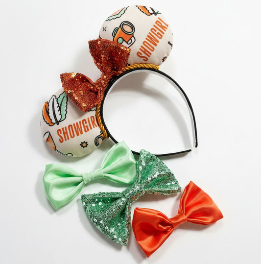 Showgirl themed mouse ears with a orange sequin bow on a black headband. Shown are other bow options in sating min green, sequin mint green and satin orange. Just leave me a note in checkout if you want a different color, please.